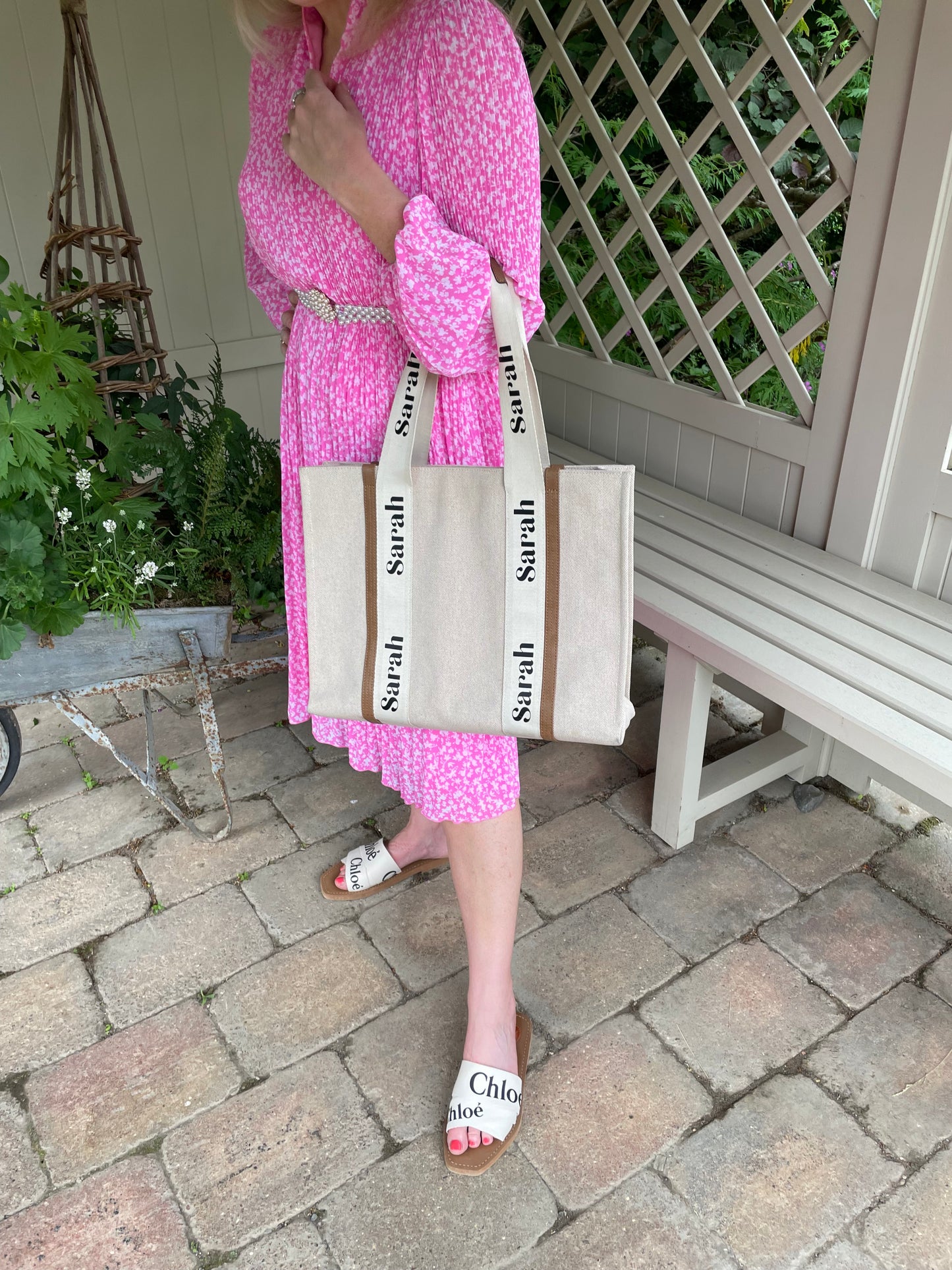 our Vivien paired with pink dress and beige sandals cream a lovely look
