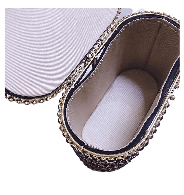 gold cage and hinged lid with stitched interior for safe storage