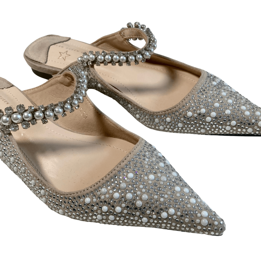 A pair of Glam Queen grey flat shoes decorated with crystals and pearls