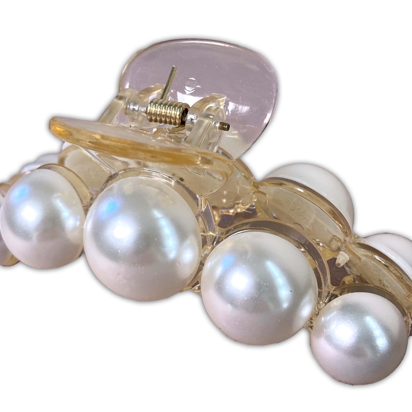 Luxury and elegant hair clip embellished with pearls and supported by a sturdy, golden frame