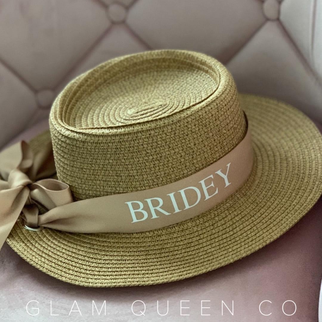personalised bridey bride hat made with straw, with a nude ribbon