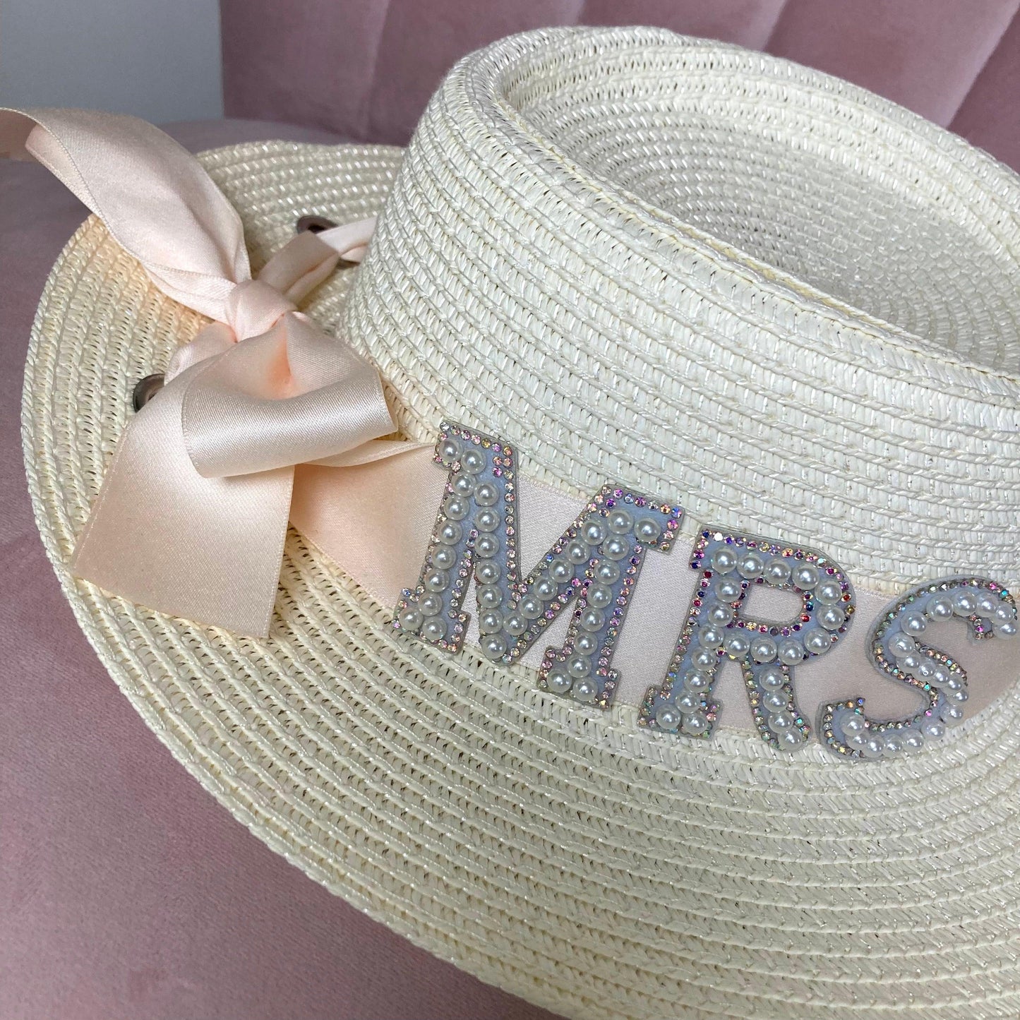 Straw bride hat in cream with iridescent rhinestone pearl lettering