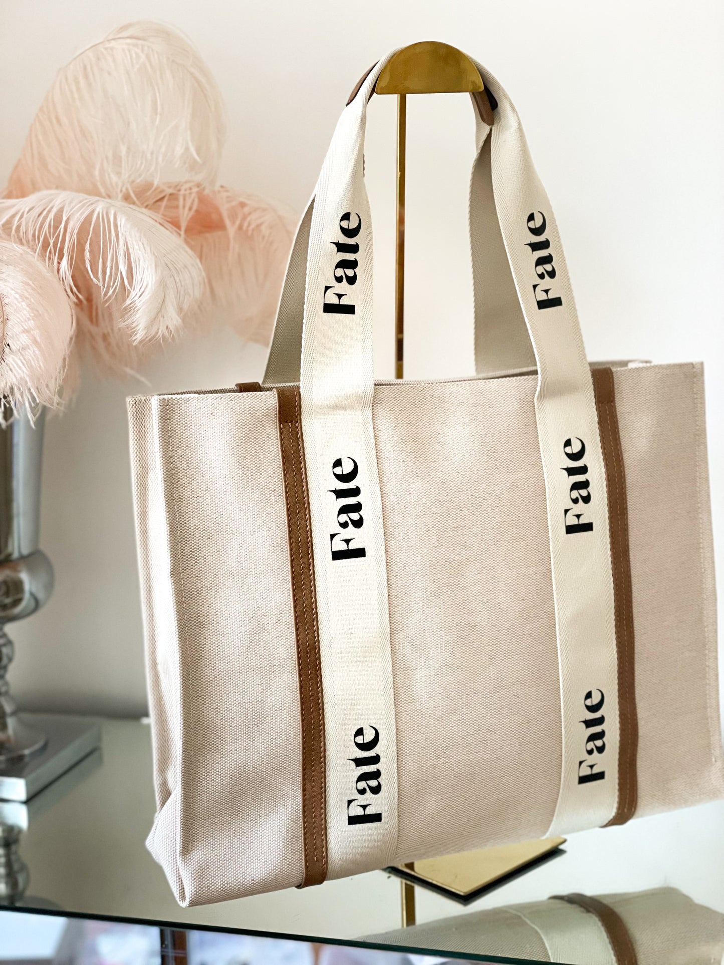 beige and brown tote, personalised tote bag secured by cream handles that have horizontal lettering which can be personalised